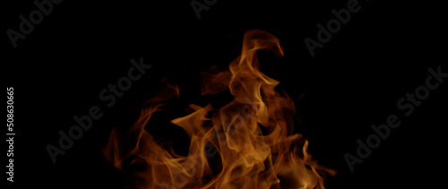 Fire Flames Igniting And Burning, Fiery orange glowing. Abstract background on the theme of fire. Real flames ignite. Royalty high-quality free stock image of  flames isolated on black background © jang