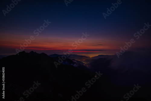 Fotobehang Scenic view of mountains against sky during sunrise