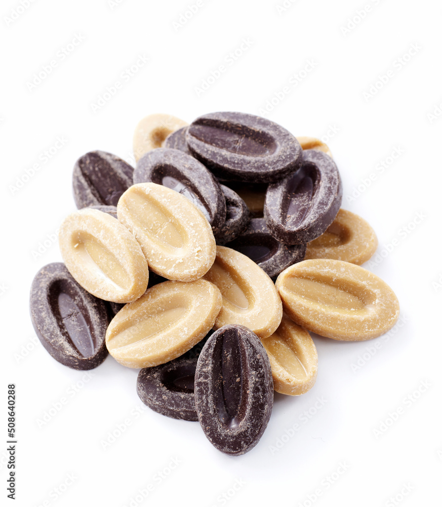 Obraz premium Black and white chocolate particles, on a white background