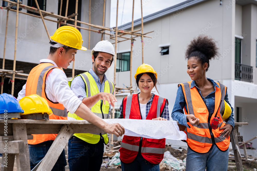 State Building Group Engineer group civil engineers male female discuss inspect construction of ...
