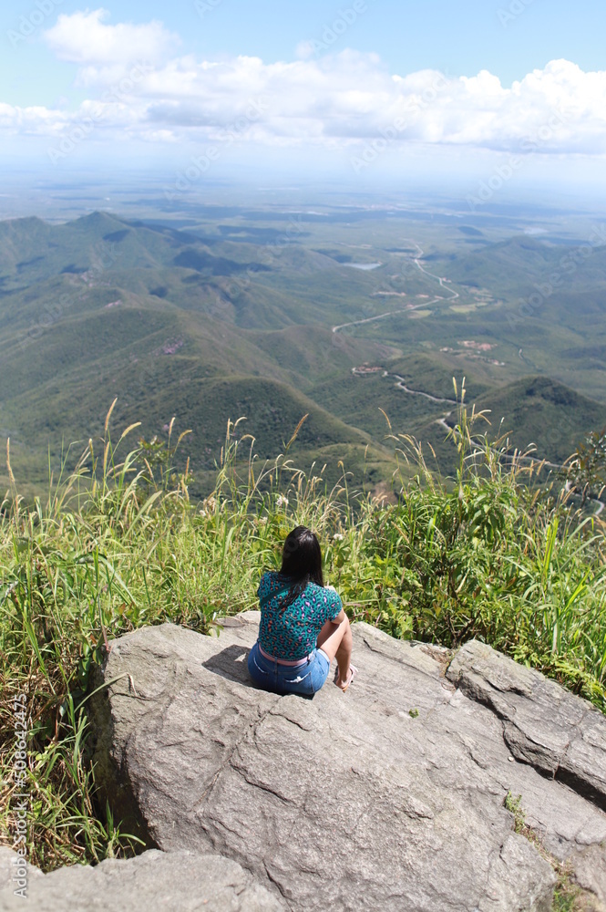 person on the top of a mountain