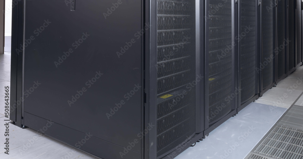 Image of empty corridor with rows of computer servers Image of empty corridor with rows of computer servers