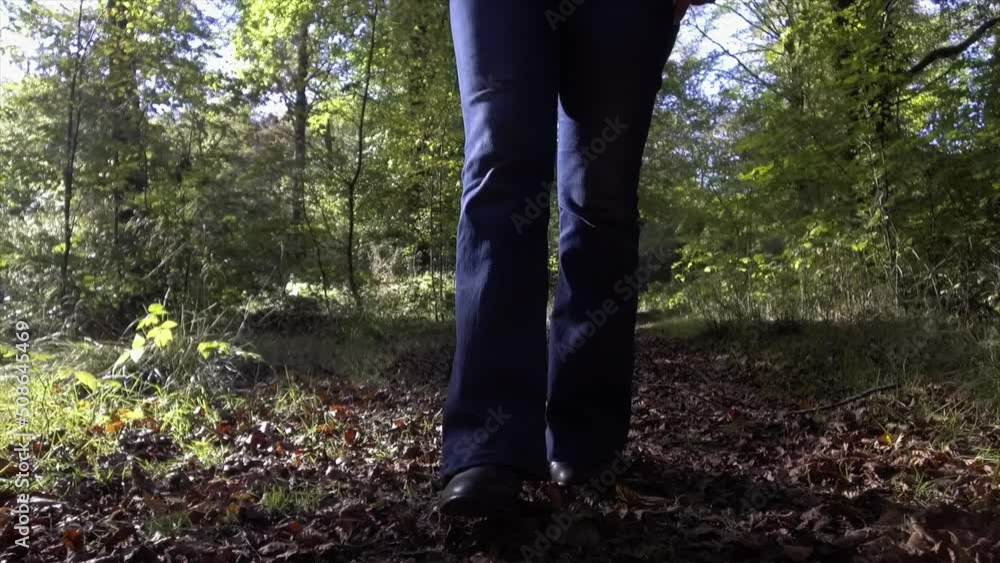 Young girl walking in Savernake Forest - England Young girl walking in Savernake Forest - England