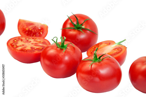 ripe tomatoes on a white background. the concept of cooking tomato sauce. red vegetables on a light texture. juicy pink tomatoes on the table