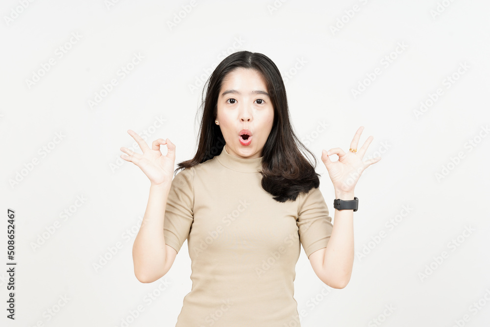 Showing OK Sign Of Beautiful Asian Woman Isolated On White Background Showing OK Sign Of Beautiful Asian Woman Isolated On White Background
