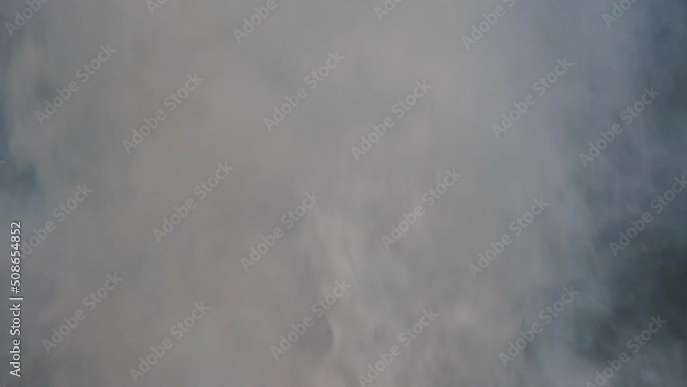 Close up view on thick smoke from wild fire or forest fire. Slow motion full HD video of fire smoke. Close up view on thick smoke from wild fire or forest fire. Slow motion full HD video of fire smoke.