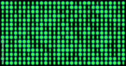 Image of changing green dots on black background
