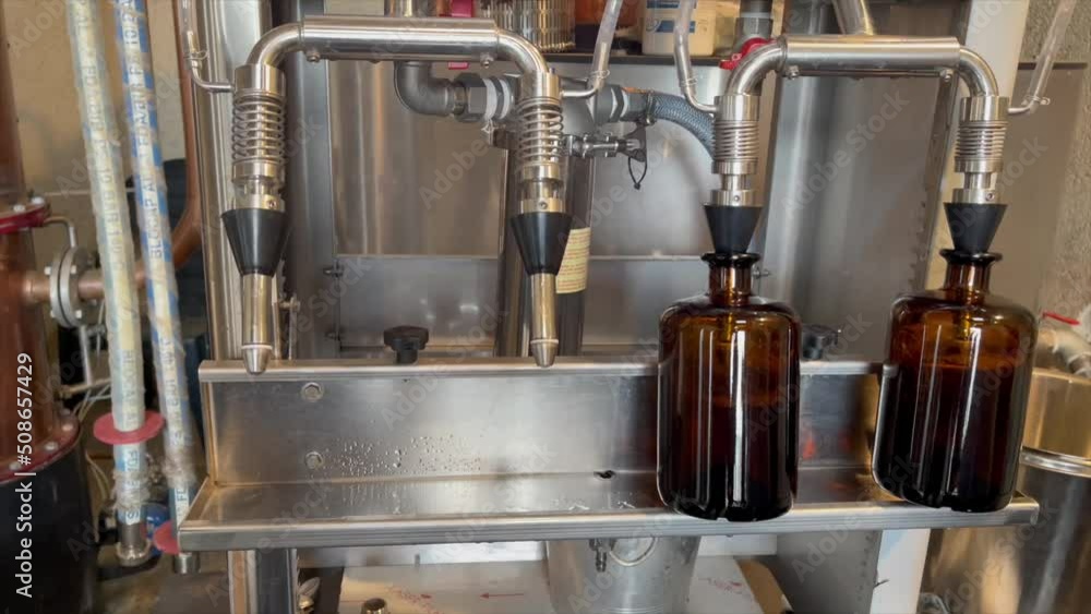 Bottling Gin in brown bottles, hand made Bottling Gin in brown bottles, hand made