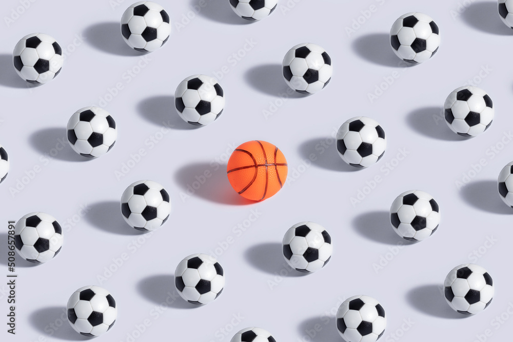 Scheme of plastic children's soccer balls with one rubber basketball in the middle. Children's toys. Scheme of plastic children's soccer balls with one rubber basketball in the middle. Children's toys.
