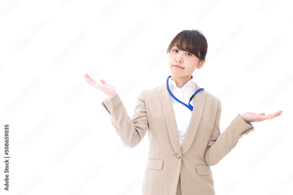 Businesswoman making a comparison with something Businesswoman making a comparison with something