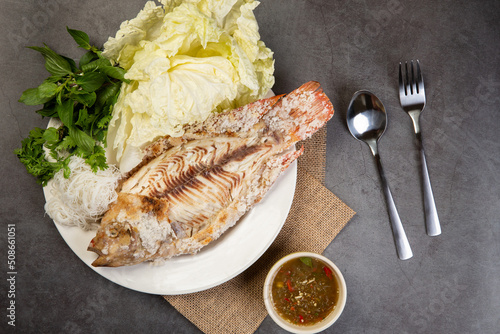 Grilled tilapia with salt and seafood sauce