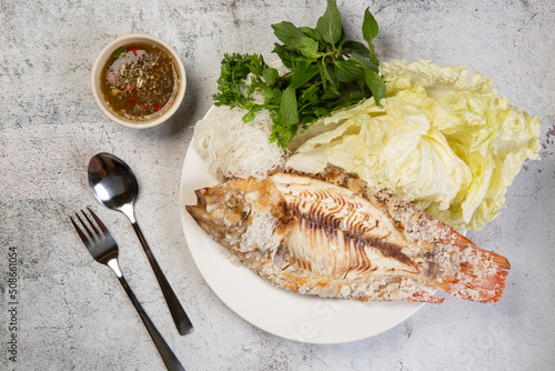 Grilled tilapia with salt and seafood sauce