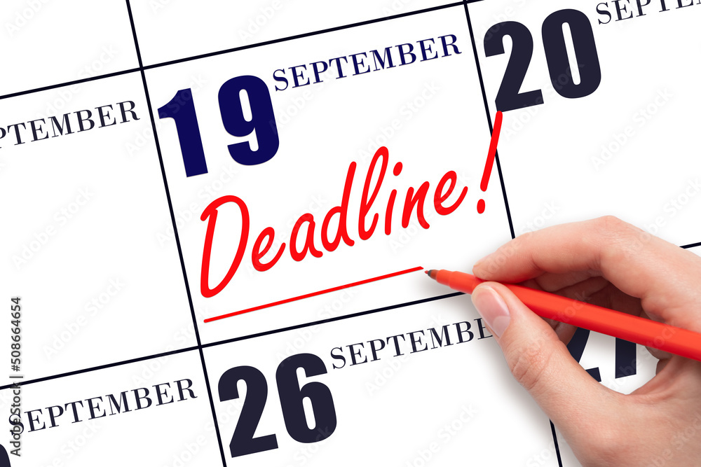 Hand drawing red line and writing the text Deadline on calendar date September 19. Deadline word written on calendar Hand drawing red line and writing the text Deadline on calendar date September 19. Deadline word written on calendar