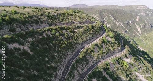 Aerial mountain view of serpentine highway. Tour de France 
