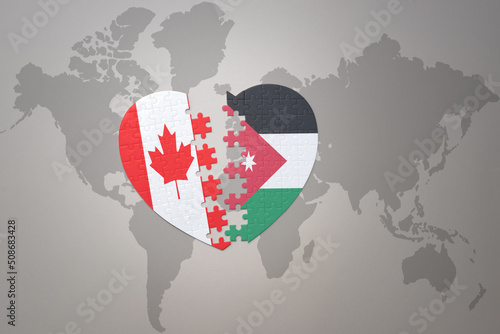 puzzle heart with the national flag of canada and jordan on a world map background.Concept.