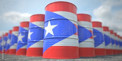 Flag of Puerto Rico on the barrels or steel drums. Chemical or oil industry related 3D rendering