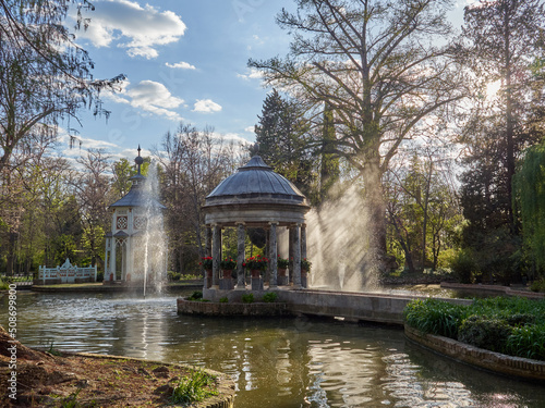 Chinescos pond in Prince’s garden in Aranjuez, with a small Greek temple with marble columns and a Chinese style small wooden pavilion. Community of Madrid, Spain, Europe photo
