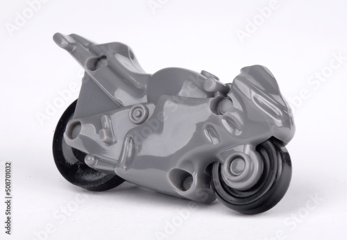 Wallpaper Mural Gray motorcycle on white background. Racing bike. Futuristic plastic toy closeup. Black wheel. Torontodigital.ca