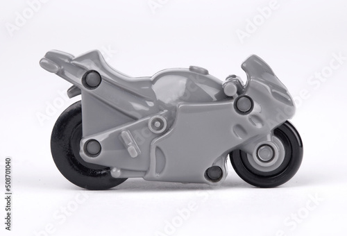 Wallpaper Mural Gray motorcycle on white background. Racing bike. Futuristic plastic toy closeup. Black wheel. Torontodigital.ca