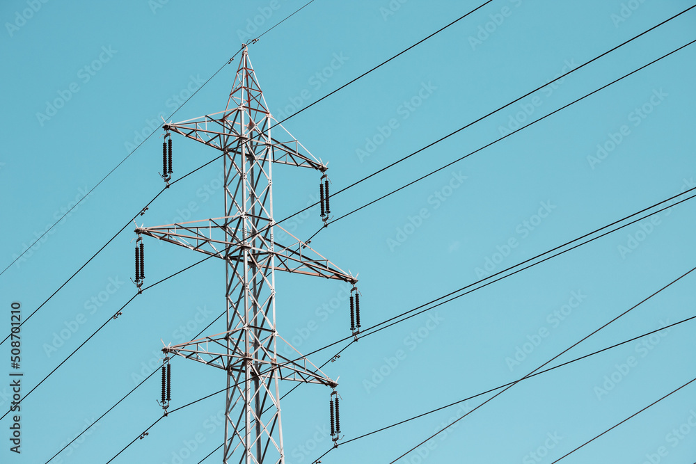 An electric pole with wires transmits energy to consumers. Infrastructure and industry An electric pole with wires transmits energy to consumers. Infrastructure and industry