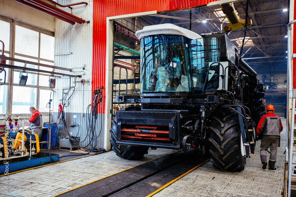 Production line of assembling agricultural tractors and harvesters Production line of assembling agricultural tractors and harvesters
