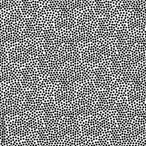 Seamless monochrome speckled pattern. Retro abstract black pattern on a white background.