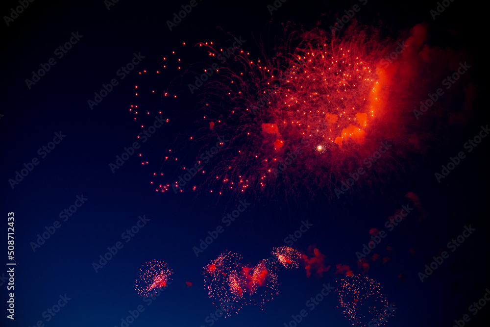 Bright red fireworks with sparks and smoke. High quality photo Bright red fireworks with sparks and smoke. High quality photo