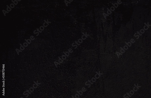 Abstract texture. Paint spots wall. Black texture. Stone background. Dark marble. Rock texture. Rock surface with cracks. Rock pile. Grunge Rough structure.