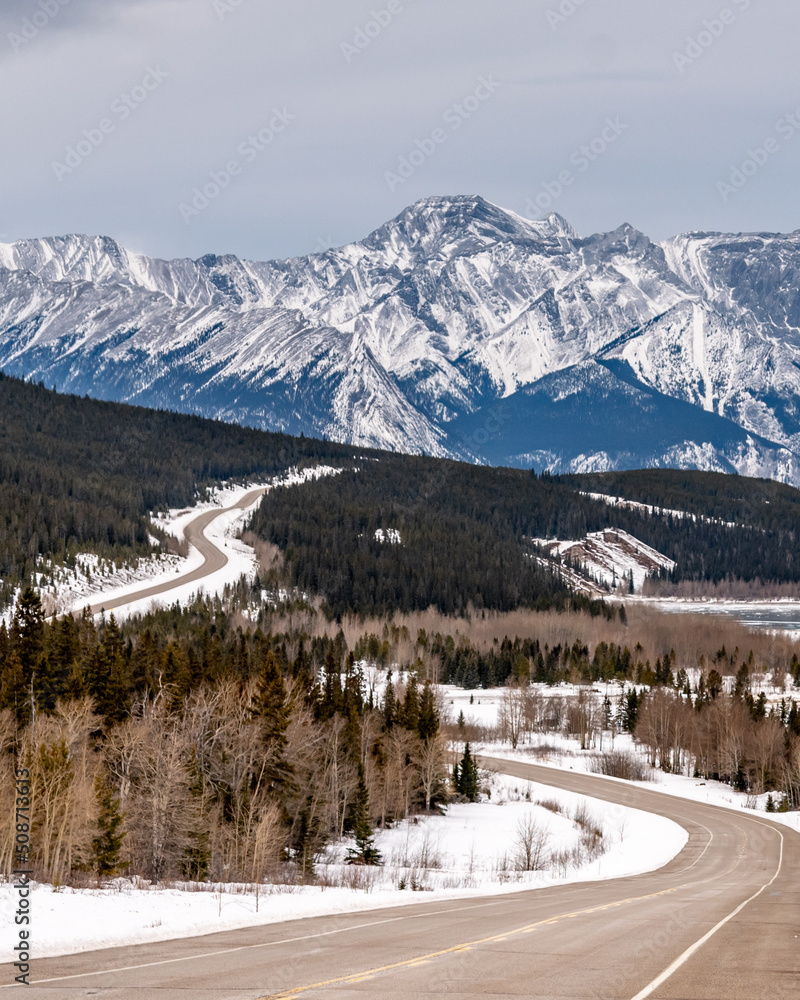 Scenic highway views in Alberta, Canada during winter season with snow covered landscape. Taken near Jasper National Park, Alberta, Canada. 
