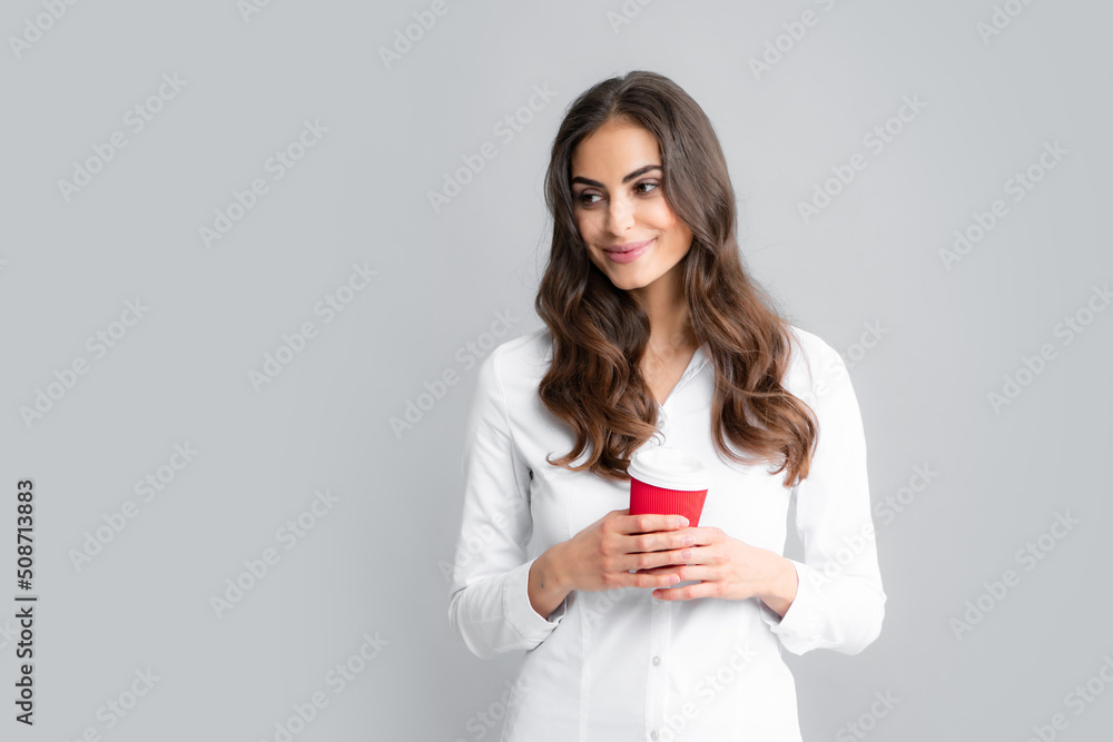 Emotion of young beautiful woman drink hot coffee, beauty face natural makeup, isolated over gray background. Emotion of young beautiful woman drink hot coffee, beauty face natural makeup, isolated over gray background.