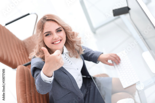 business woman showing thumb up,