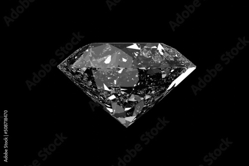 Side view of a round brilliant cut diamond isolated on black background.