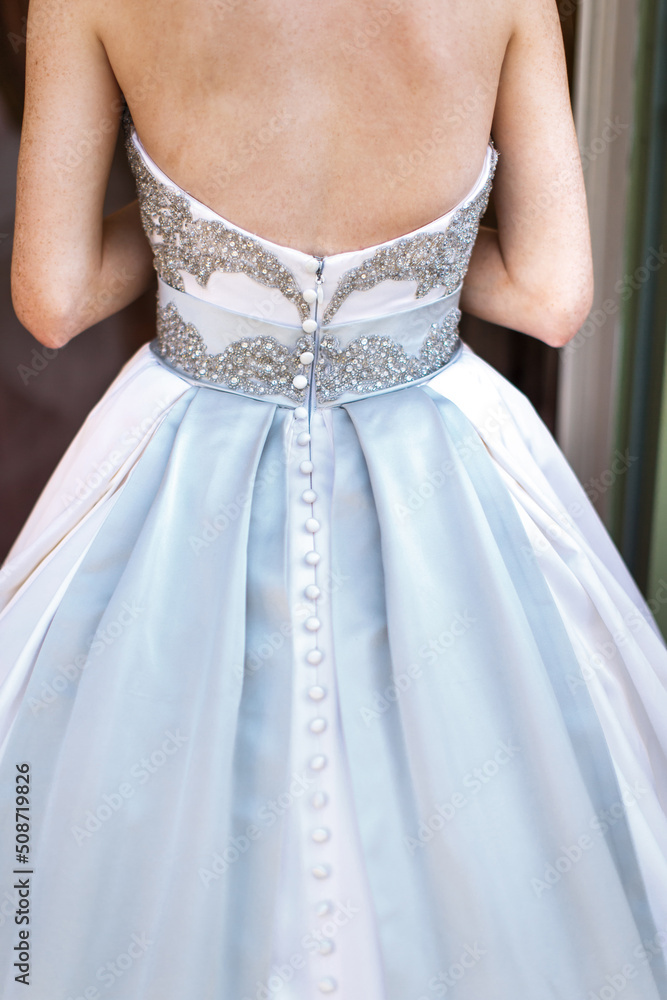 Bride's back in the wedding dress Bride's back in the wedding dress