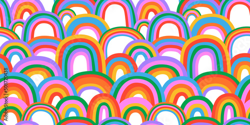Diverse colorful rainbow doodle seamless pattern illustration. Multi color rainbows cartoon in funny hand drawn style. LGBT issues or diversity spectrum background concept.