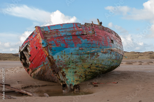 A wooden shipwreck on a beach (crow point, Devon, UK)