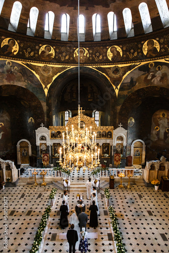 Newlyweds on wedding ceremony in the church