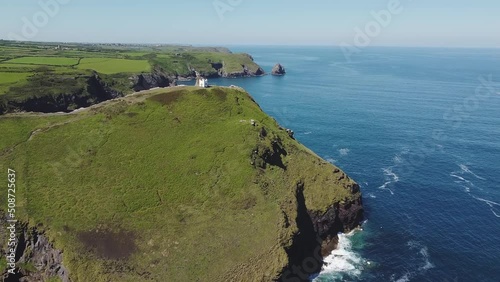 Aerial drone shot of Boscastle, harbour and its rugged coastline. Picturesque seaside village in Cornwall, England. photo