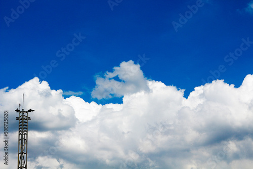 Transmission towers stand tall in the sky.