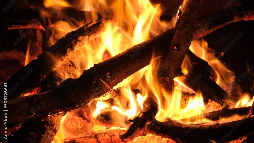 The night fire sparkles and creates a warm mood and comfort The night fire sparkles and creates a warm mood and comfort