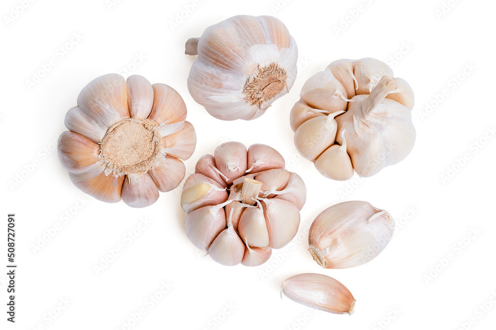 Top view Fresh peeled garlic cloves, bulb  with garlic slices isolated on white background