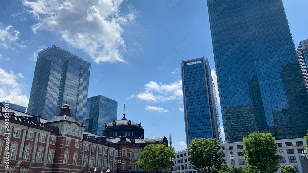 Tokyo sky year 2022 with Tokyo station and Marunouchi buildings in the back, June 4th summer