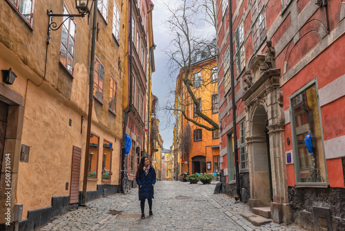 Stockholm Sweden  city skyline at Gamla Stan old town with woman tourist