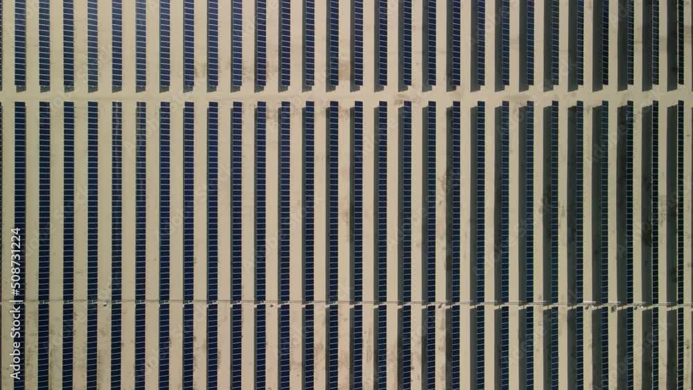 Aerial top down view of solar power plant with array of solar panels in california desert. Aerial top down view of solar power plant with array of solar panels in california desert.