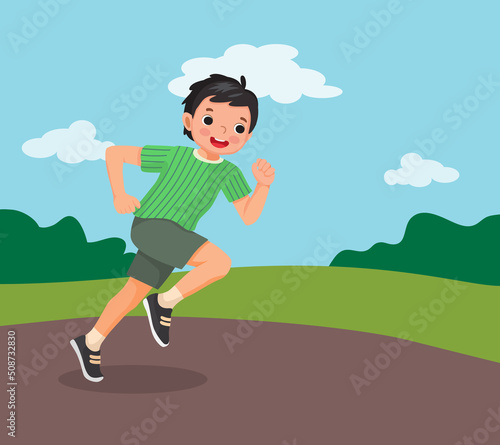 cute little boy running jogging on the park on summertime