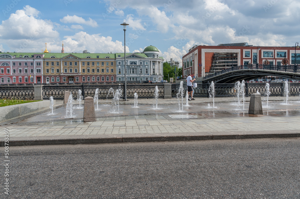 Bolotnaya embankment with fountains in Moscow on June 02, 2022