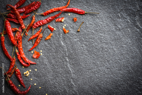 Fotobehang Dried chili on dark background - Red dried chilli pepper cayenne on a stone