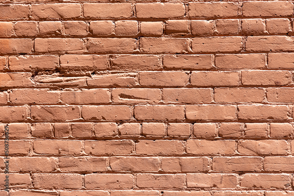 Obraz premium old red ochre painted clean brick wall