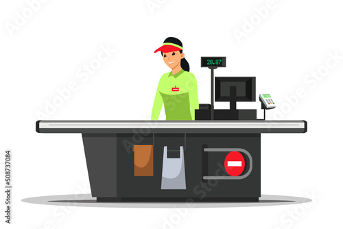 Female cashier in uniform of supermarket checkout standing at counter, waiting customers