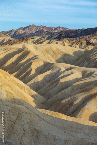 scenic view of Zabrskie point in the death valley in sunset mood
