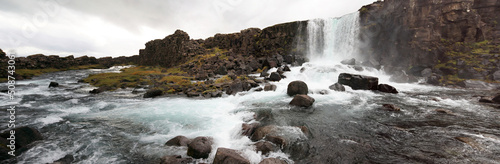 Oxarárfoss - the waterfall in Thingvellir national park, Iceland photo